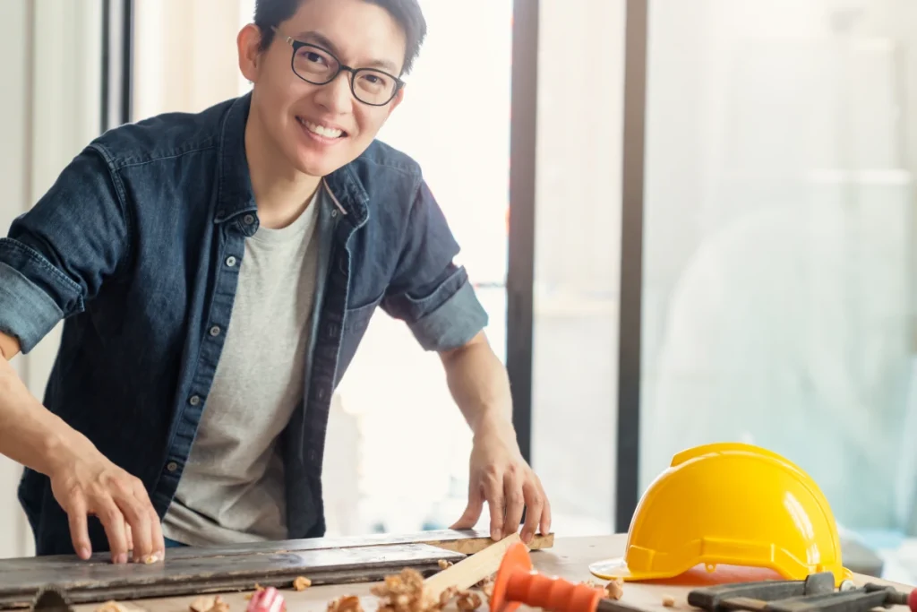 smart attractive handy glasses asian male craftman interior designer focus wood working site constrution home interior design house renovation improvement concept - DESCOR - Davao Eagle Steel Corporation